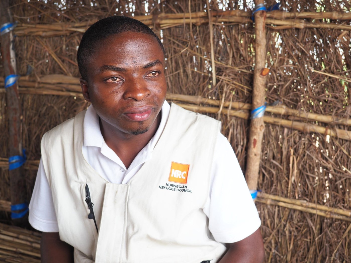 Justin Aganze works as a food security assistant with NRC for less than a year. He was attracted to the organization based on his experience living as a displaced youth years ago in Tanganyika and the NGOs that helped his family during that difficult time. Justin and his family fled their town and walked for days sheltering in forests and churches with very little to eat.
"Death would have been better because we were suffering so much. It was worse than hell, " he said.
Justin understands the plight of displaced youth living because of that time he spent having to flee and survive in the worst conditions. He has taken his work even beyond NRC and works in his spare time as a youth mentor.
Between October 25-26, 2018, NRC offered cash assistance to 7,900 people living in the Mwaka Displacement Camp in Tanganyika province giving them the opportunity to buy food, clothing and household items so that they can survive and have some comfort despite their difficult living conditions.
Photo: Ingrid Prestetun/NRC