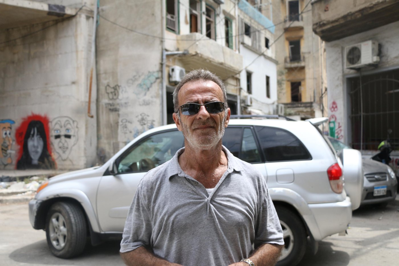 Movses was at his house when the explosion happened, he ran to the balcony immediately when he heard the sound,  the blast threw him, his wife and his 10-year-old daughter away. "When we regained consciousness, I didn't believe my eyes, everything was destroyed, it was like an atomic bomb", Movses explains, "I couldn't find a place to stay at with my family, so we are sleeping in our damaged house, what else can we do?" Volunteers helped Movses cleaning his apartment and giving assessment, "this is not enough, many people came and promised us help, but honestly, I don't see a point in that, this is hopeless. I want to leave this country, there's no hope for us to stay anymore. Do you want more than that?" Movses was injured on his head and all over his body. "My injuries weren't as painful as seeing my daughter covered in blood, I wasn't able to protect my own daughter." He concluded.

Photo: Zaynab Mayladan/NRC