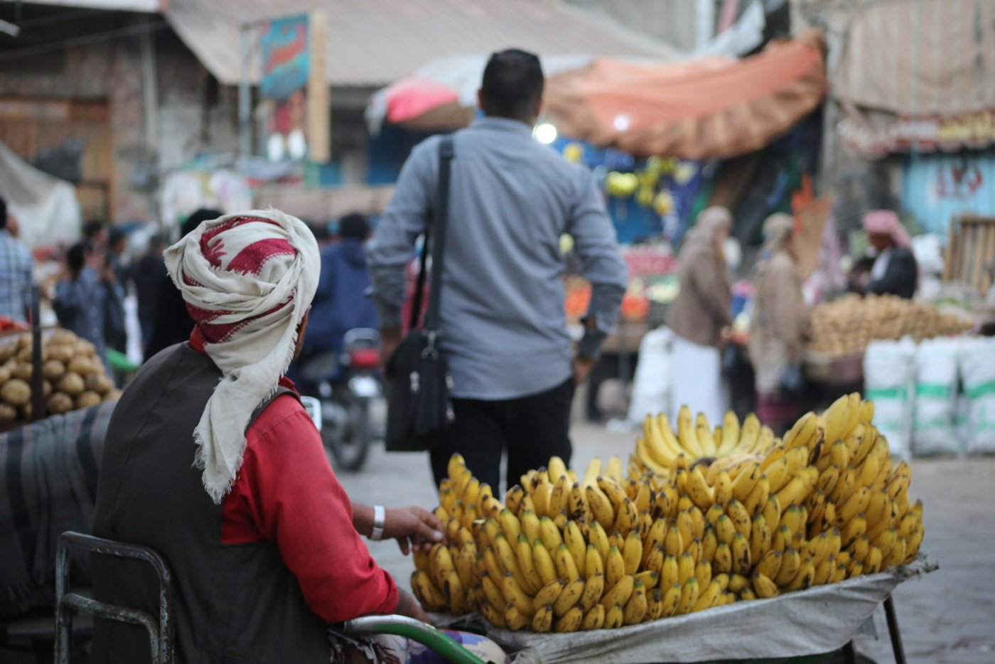 Mustafa" (not his real name), 38-years-old, was a Yemeni teacher. He is now selling bananas in one of Taiz's markets. According to Save the Children, more than half of Yemen's teachers and education personnel have been forced to find second sources of income, as they have not received regular pay since 2016." Who could imagine that I would reach that point in my life? I left my school, and now I am selling bananas. I am in the worst situation, and I can do nothing. But maybe I'm luckier than other teachers who are still waiting for their salary to come?" 

Photo: Khalid Al-Banna / Norwegian Refugee Council